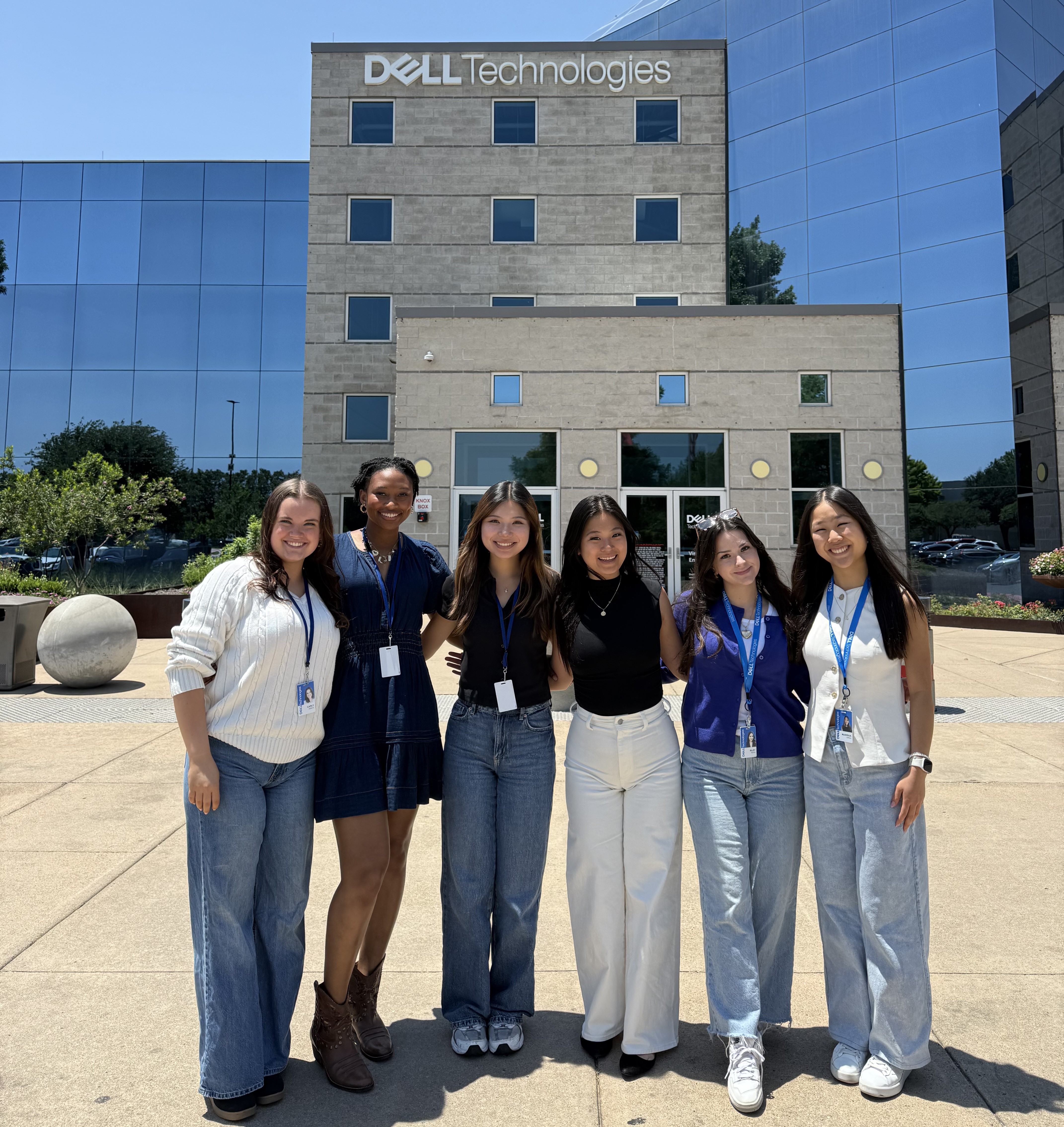 Elva outside of the Dell building with other interns.