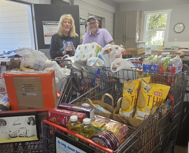 Jill volunteering and helping with food donations