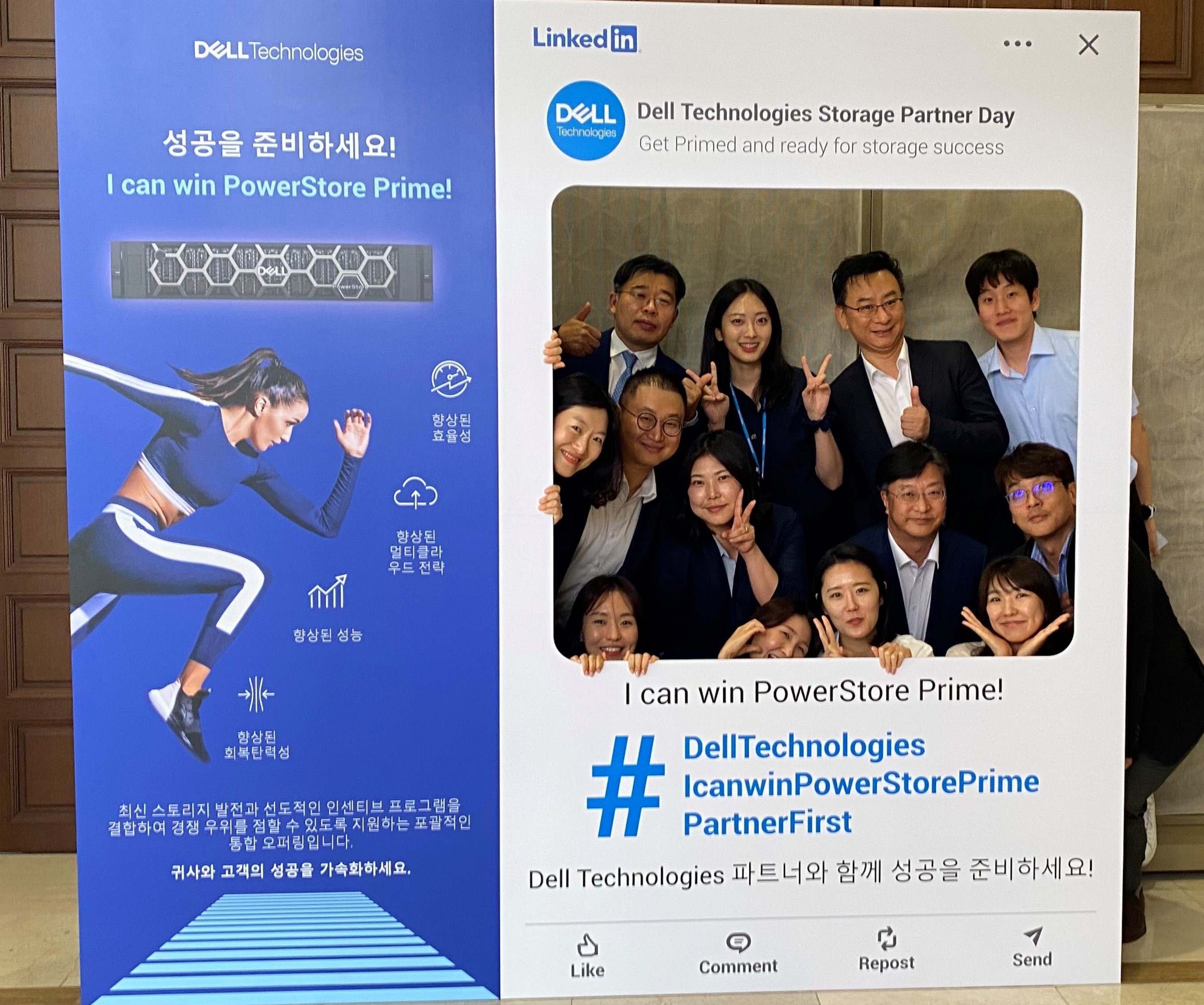 Jin Kyung poses with coworkers and a Dell social post sign