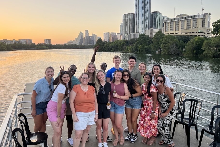 Kallan poses with her graduating MDP class in downtown Austin.