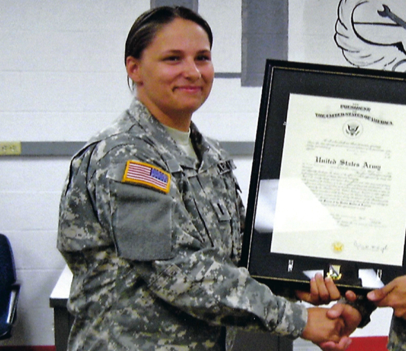 Dr. Krystal accepting a certificate in the Army