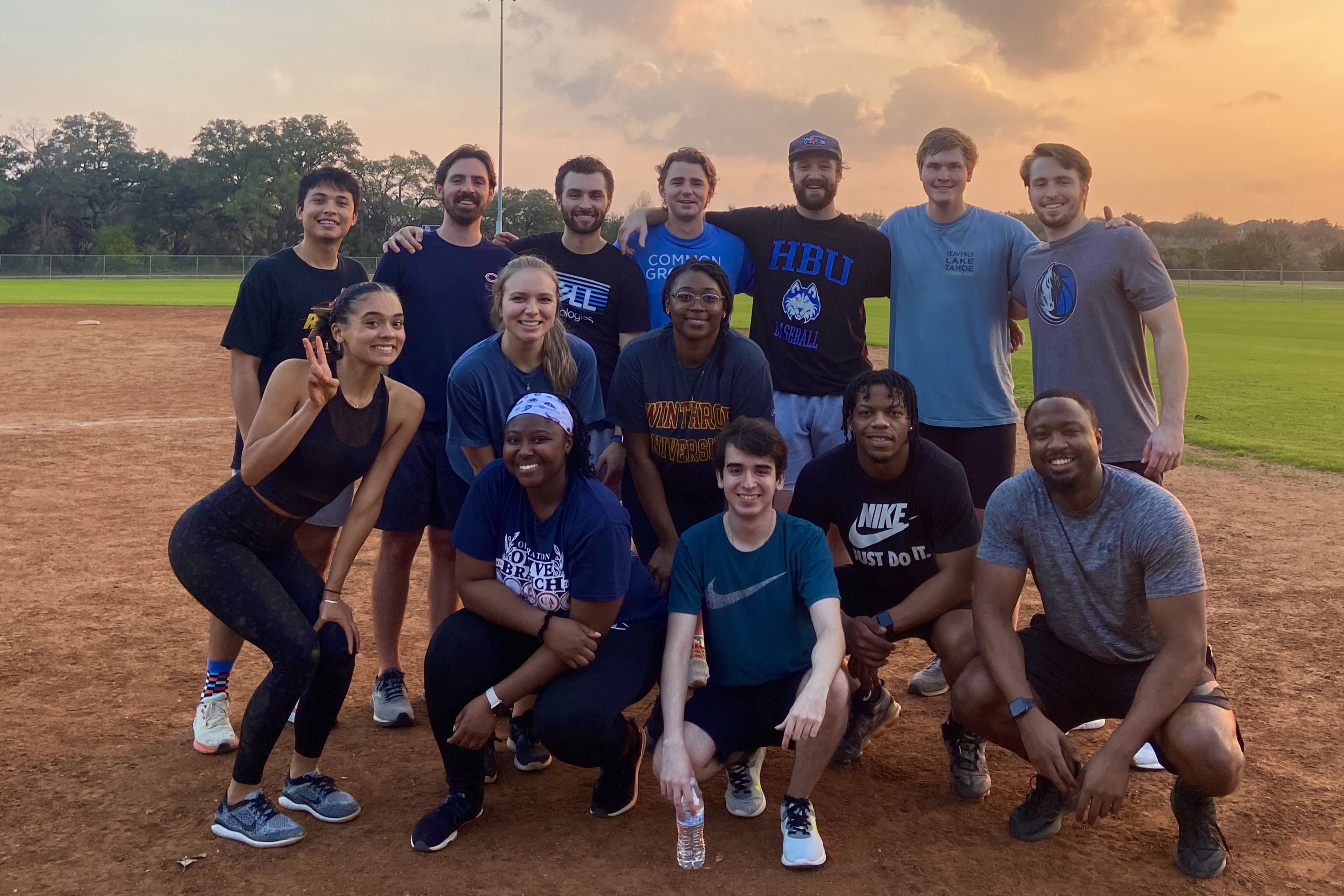 Melissa playing kickball with coworkers