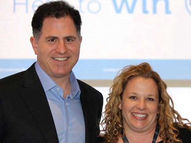 A picture of Roe with Michael Dell