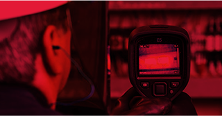 Employee using a thermal camera