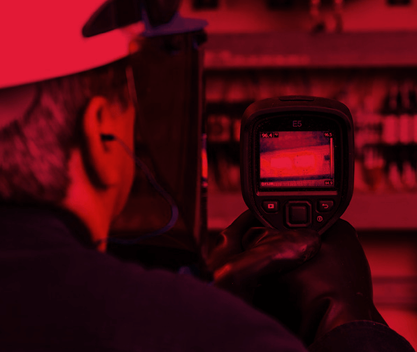 Employee using a thermal camera