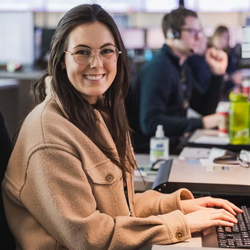 Woman typing on a computer keyboard