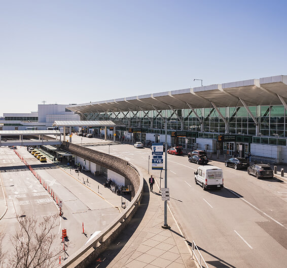 A wide outside overview of an airport terminal