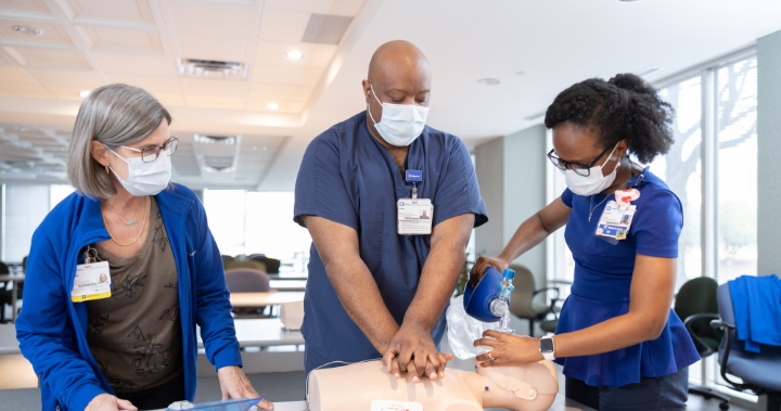 image of respiratory care team members practicing cpr