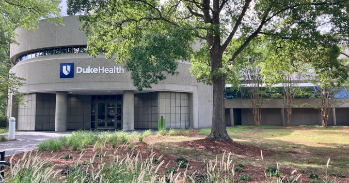 prmo building entrance with Duke Health sign.
