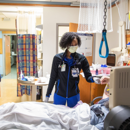 Jaysia high fives a patient under her care.