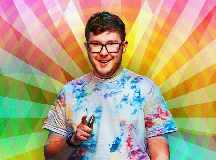 Man in glasses with multi coloured background