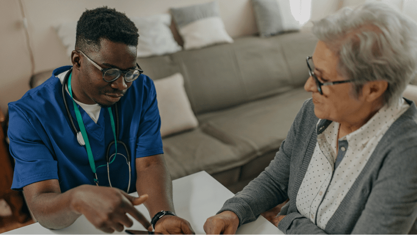 aide caring for a woman
