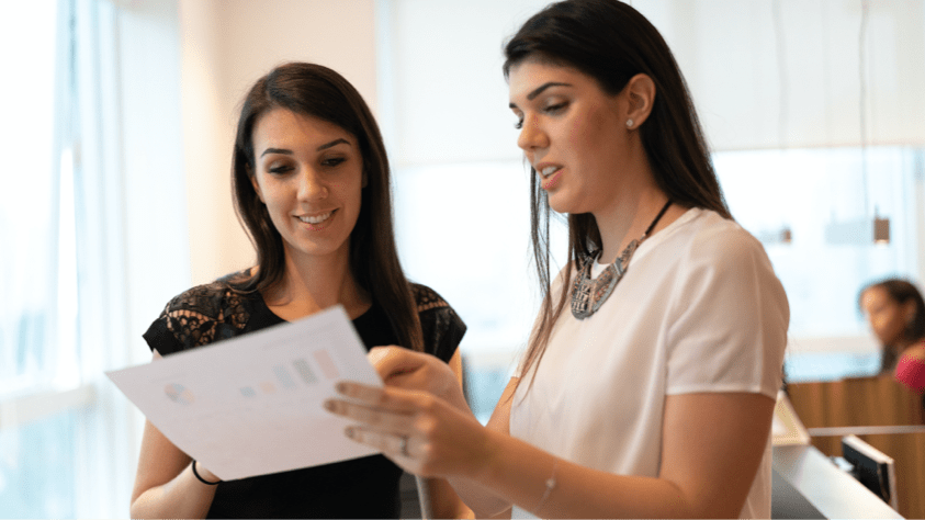 two office workers talking