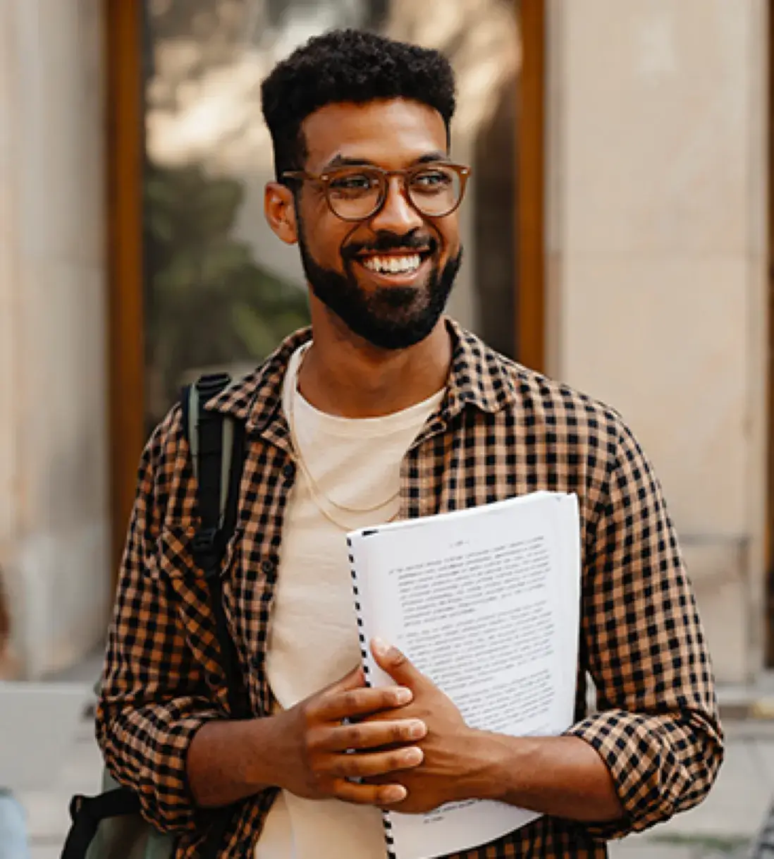 Man holding a notebook