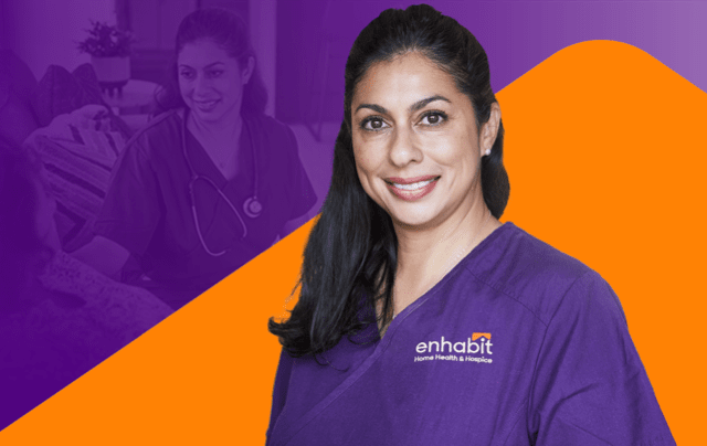 A nurse smiling in front of a purple background