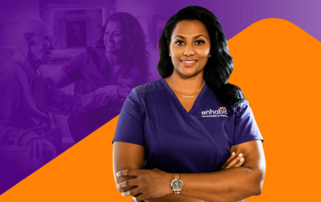 A nurse smiling in front of a purple background