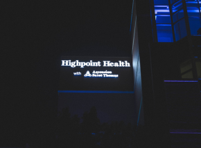 night hospital exterior shot with Highpoint Health branding and video about Light the Night event