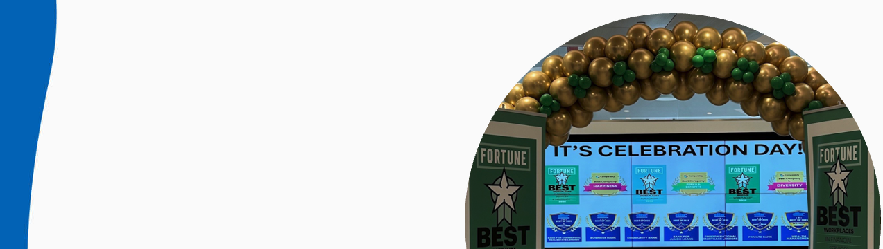 Celebration balloons entering an office building