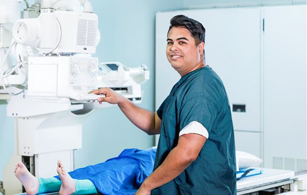 Female Imaging and Radiology employee posing for picture