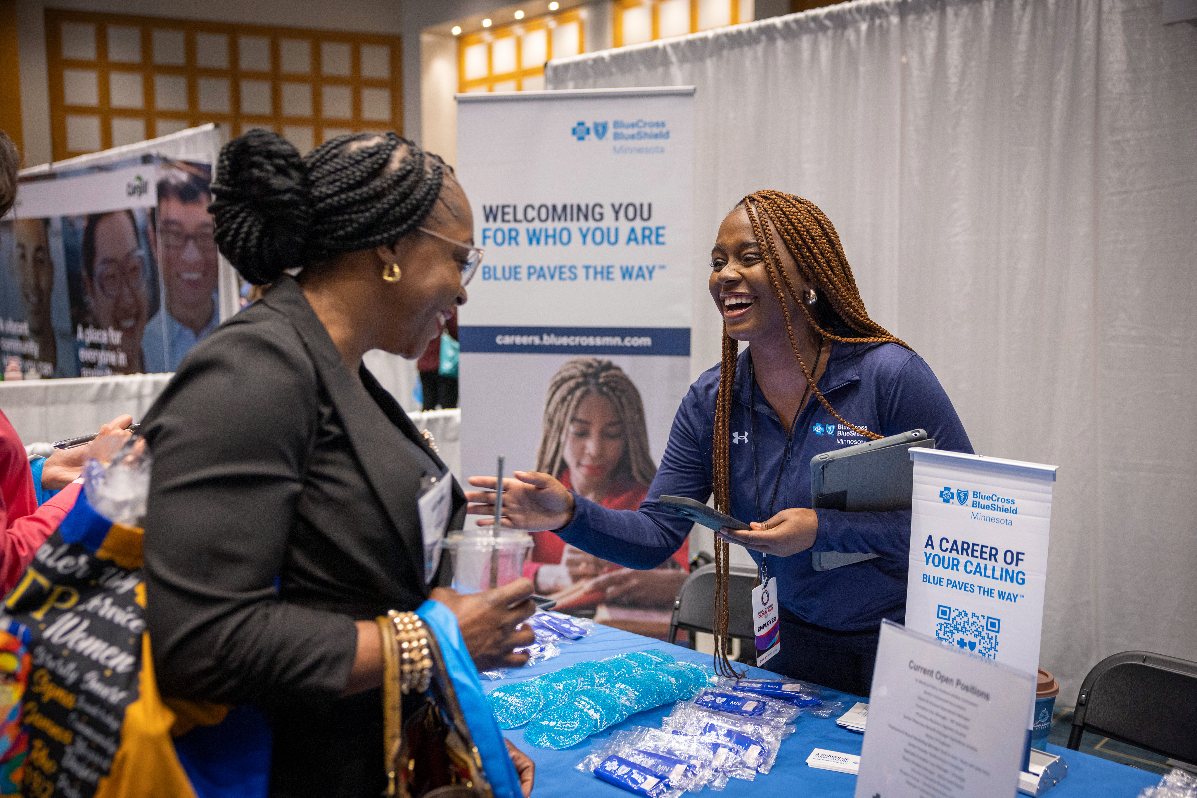 two women at a networking event