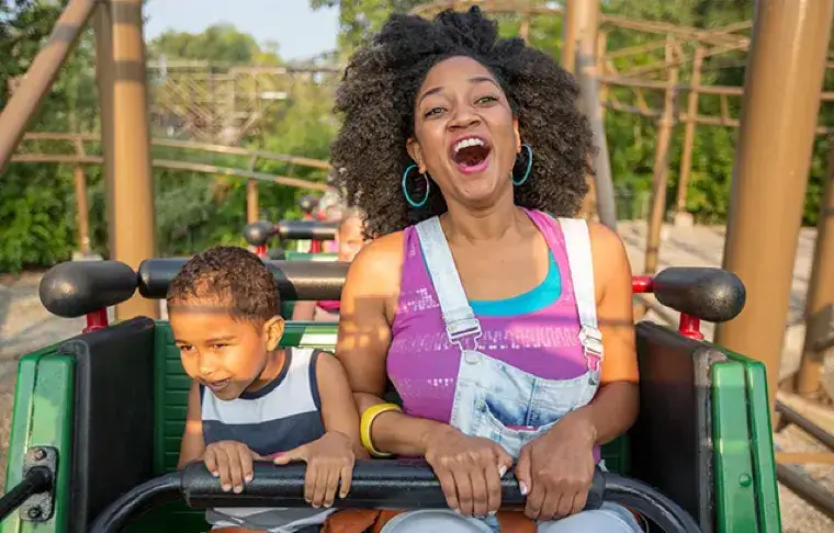 Mother and child on a roller coaster
