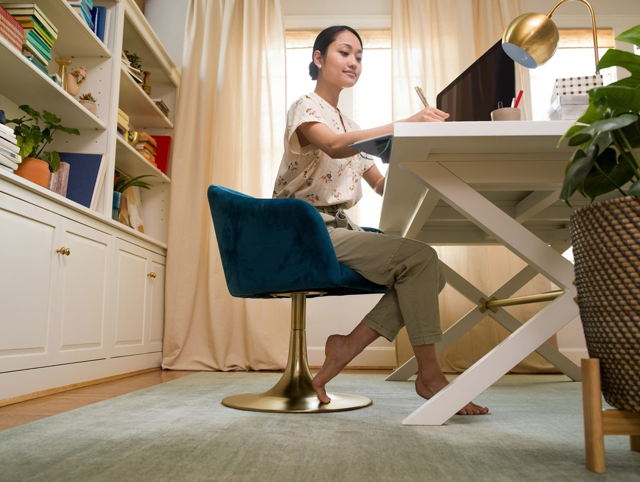 iRobot employee working from home at her desk