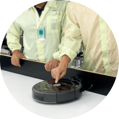 iRobot Researchers working on a roomba