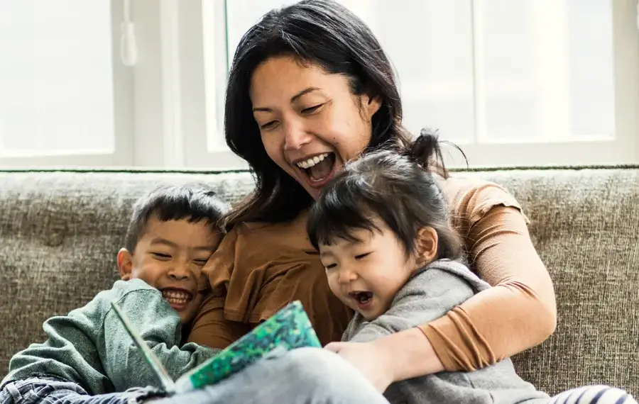 A mother reading to her kids