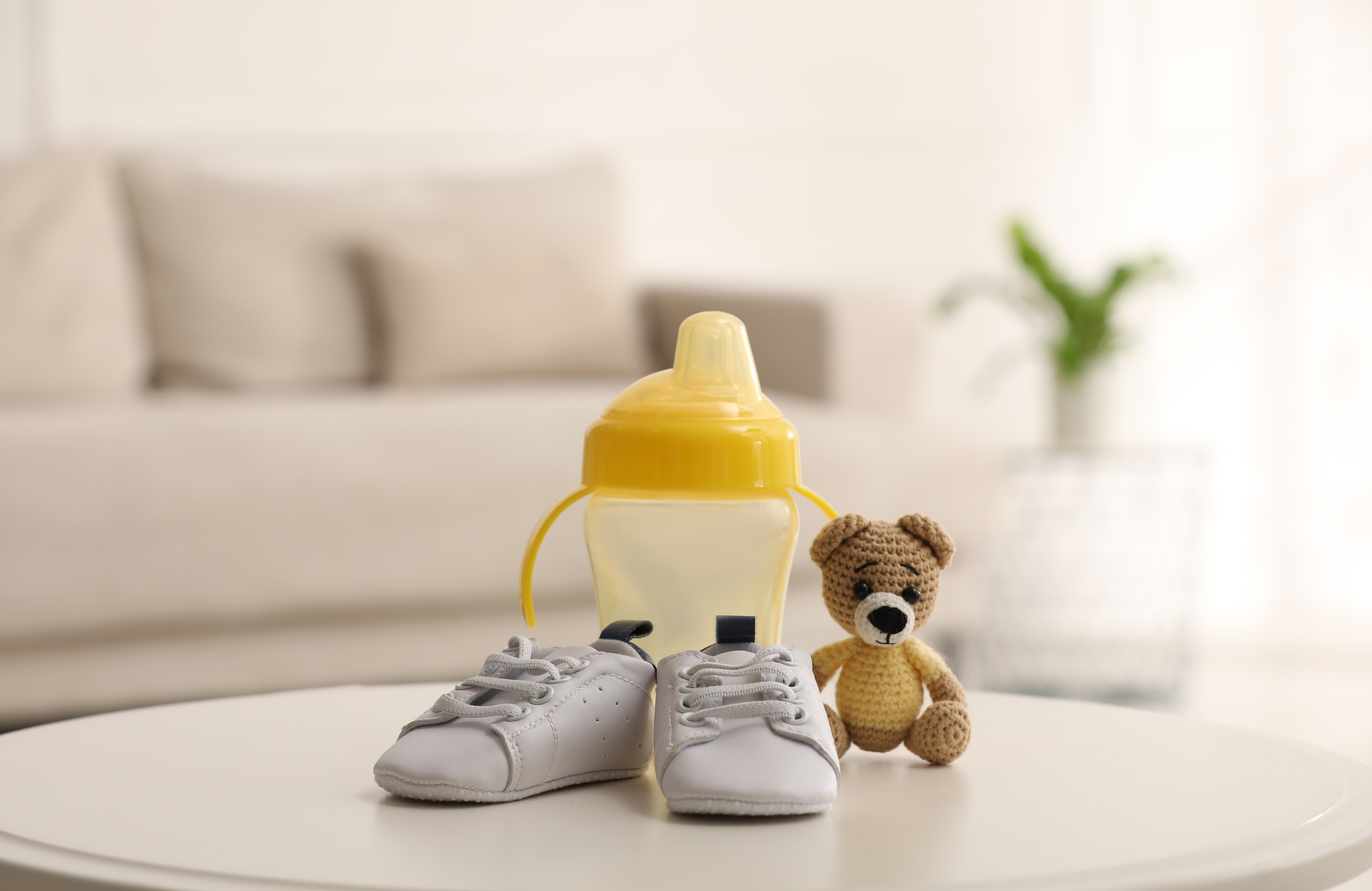Baby shoes on table