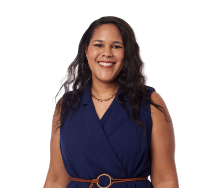 Smiling woman in a blue dress.