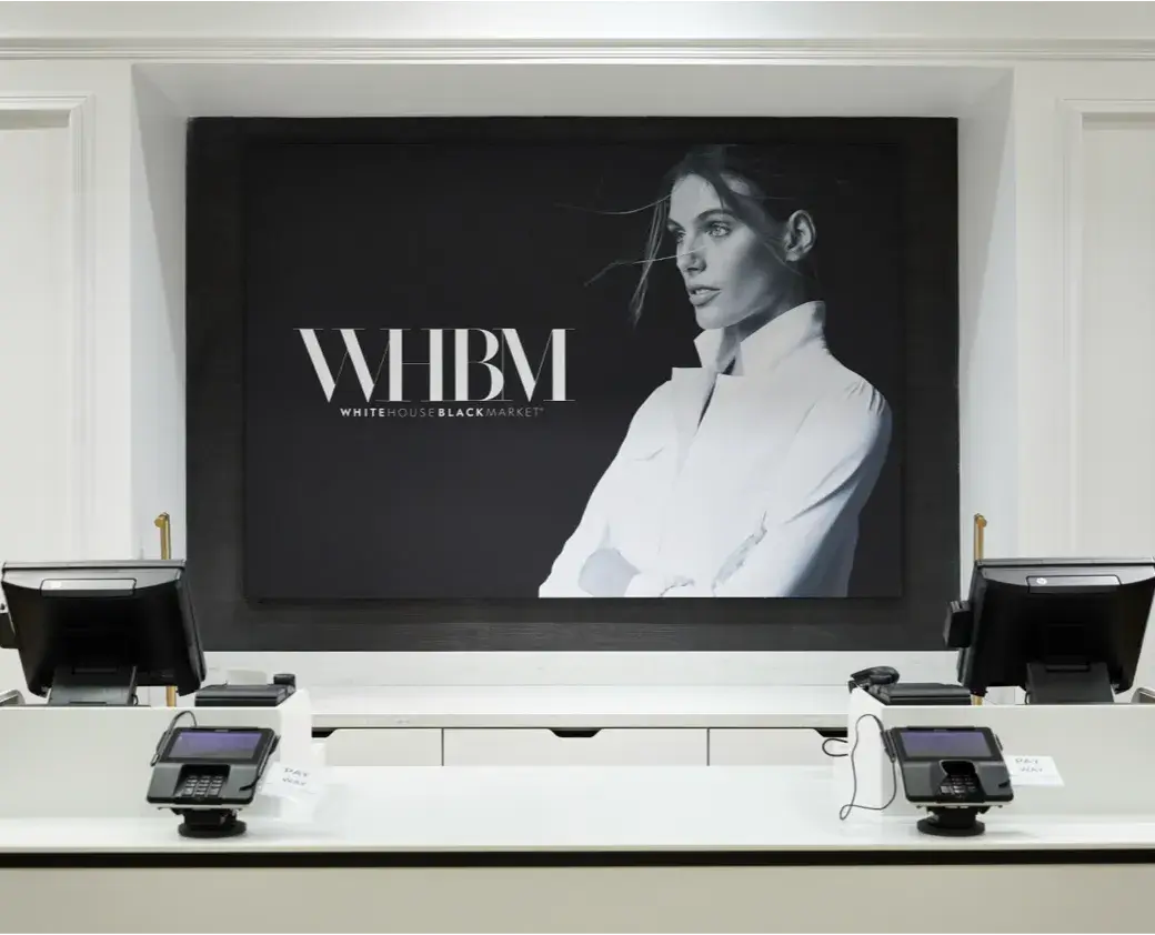 WHBM sign behind cash registers