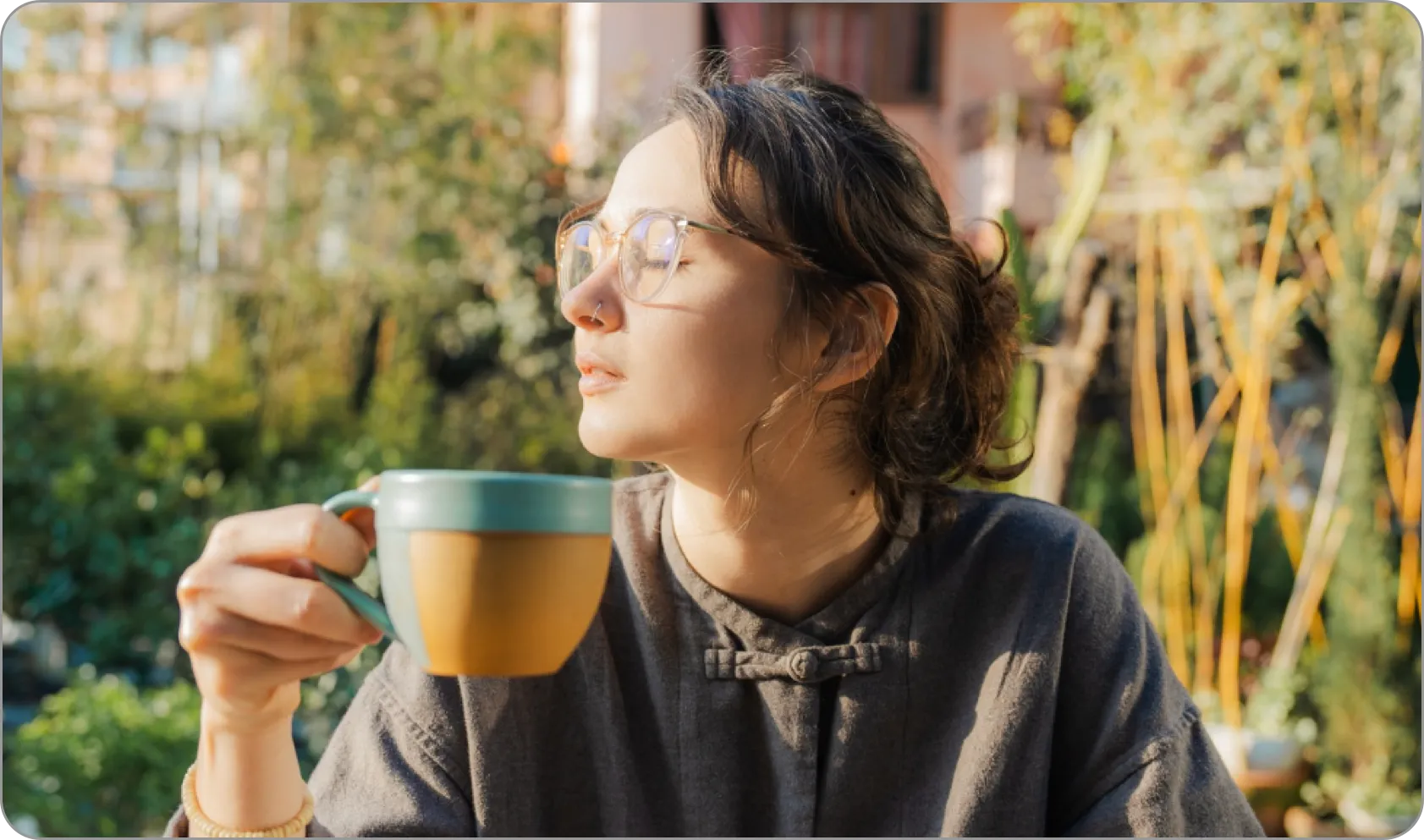Coffee cup on wooden table in natural light, symbolizing calm and mindfulness.