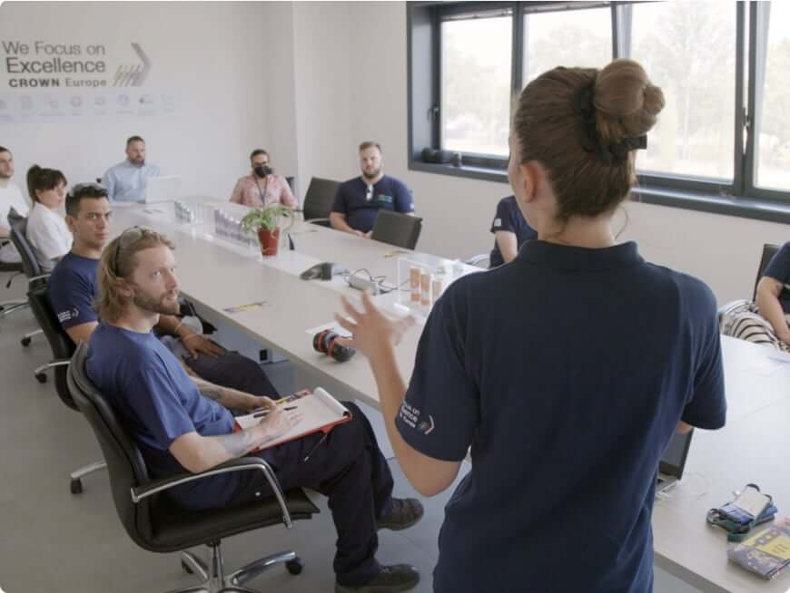 Women talking to group of people