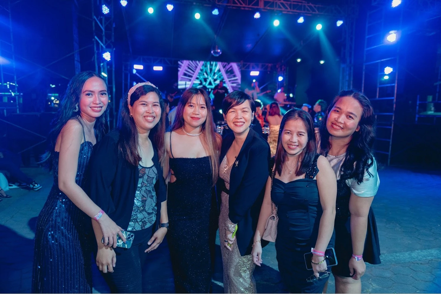 TTEC Philippines employees at evening event.
