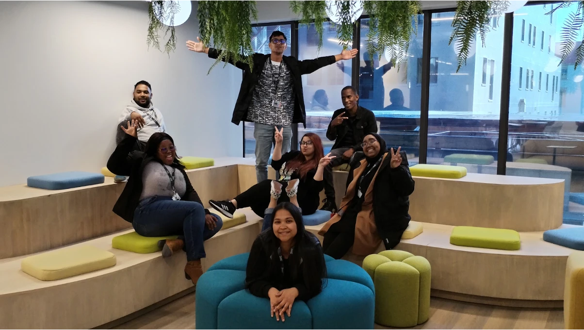 Image of happy employees in an office setting