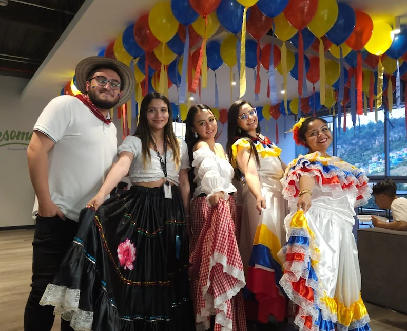 TTEC Colombia team members wearing Pollera Colorada.