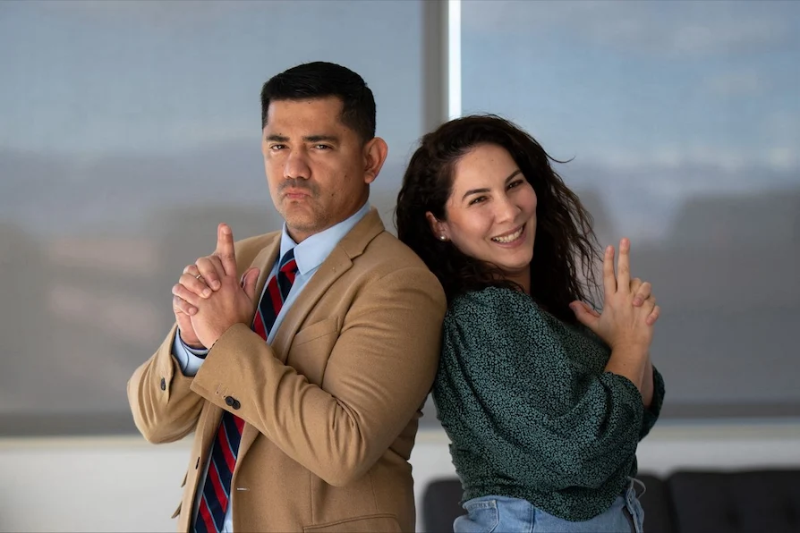 TTEC Familia core members, Javier and Helen, posing candidly for a picture.