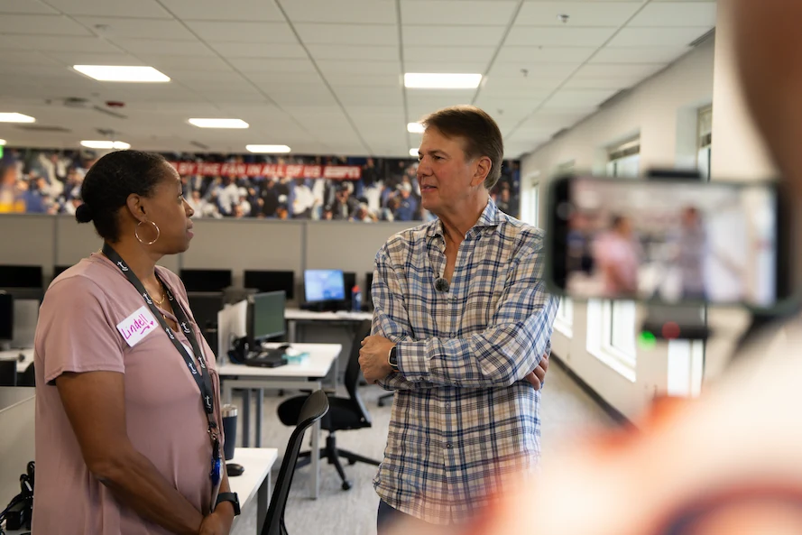Lindell with TTEC CEO, Ken Tuchman