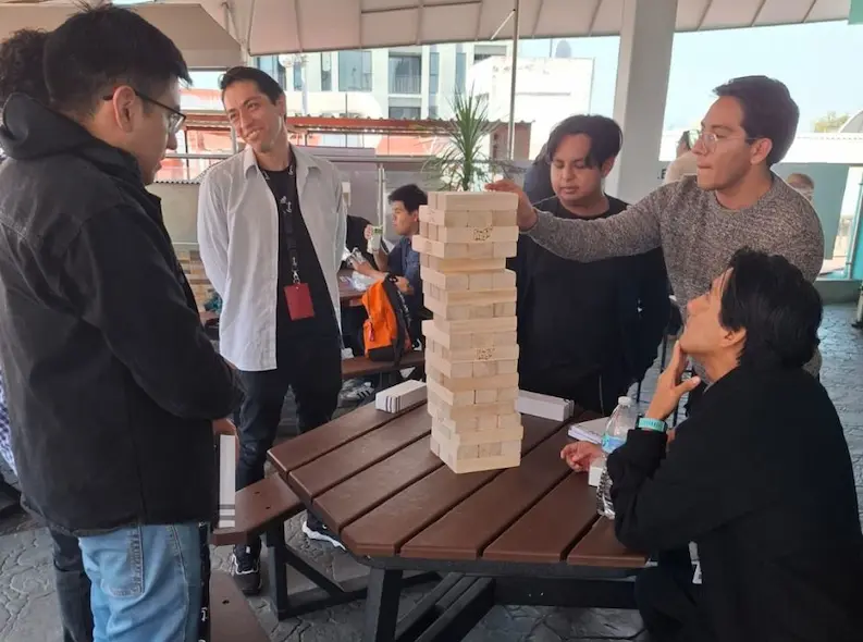TTEC Mexico team members playing Jenga