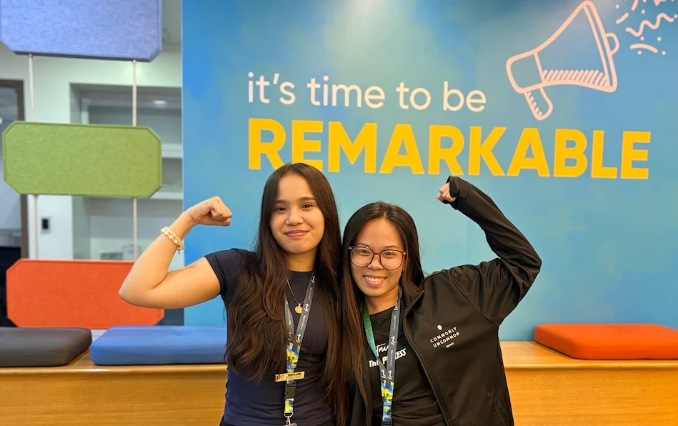 Two TTEC Philippines team members posing for a photo.