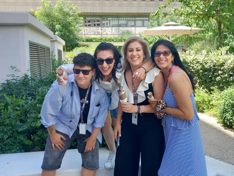 Four TTEC employees eating ice cream and having fun.