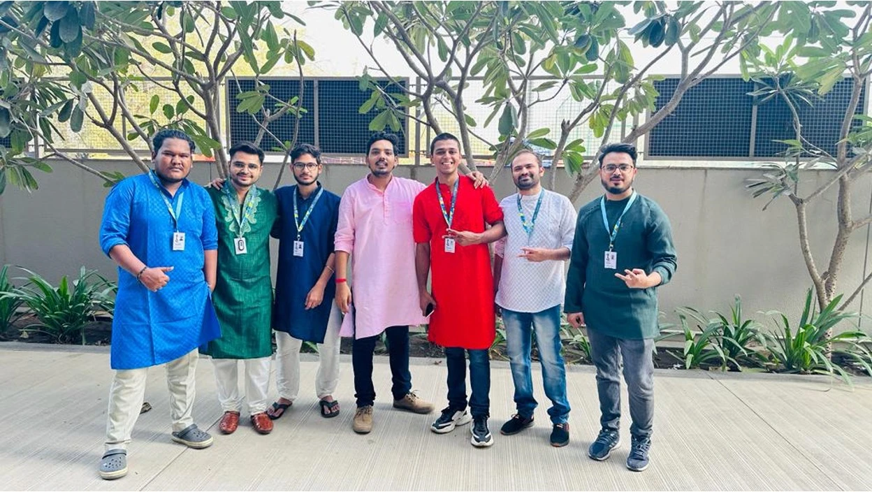 TTEC India standing outdoors.