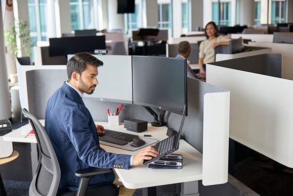 Man working in technology on computers at Staples