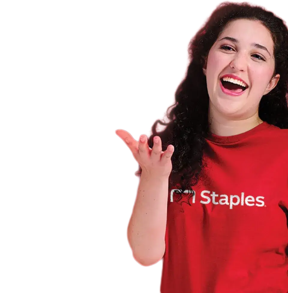 Woman in a Staples shirt smiling