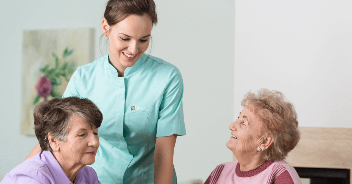 Ciena employee talking to seated residents