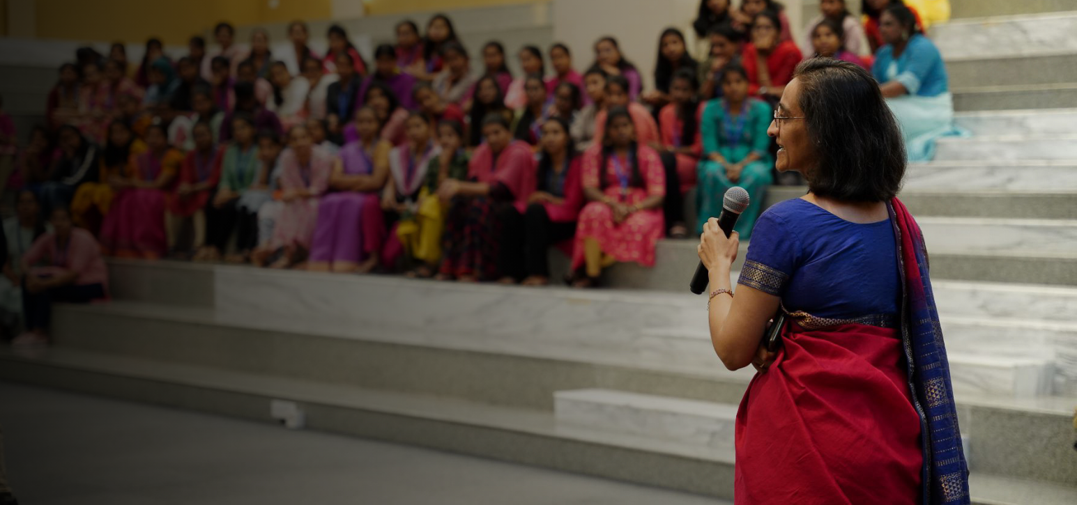 woman speaking to other women