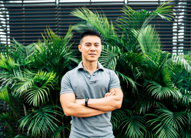 Man posing with arms crossed