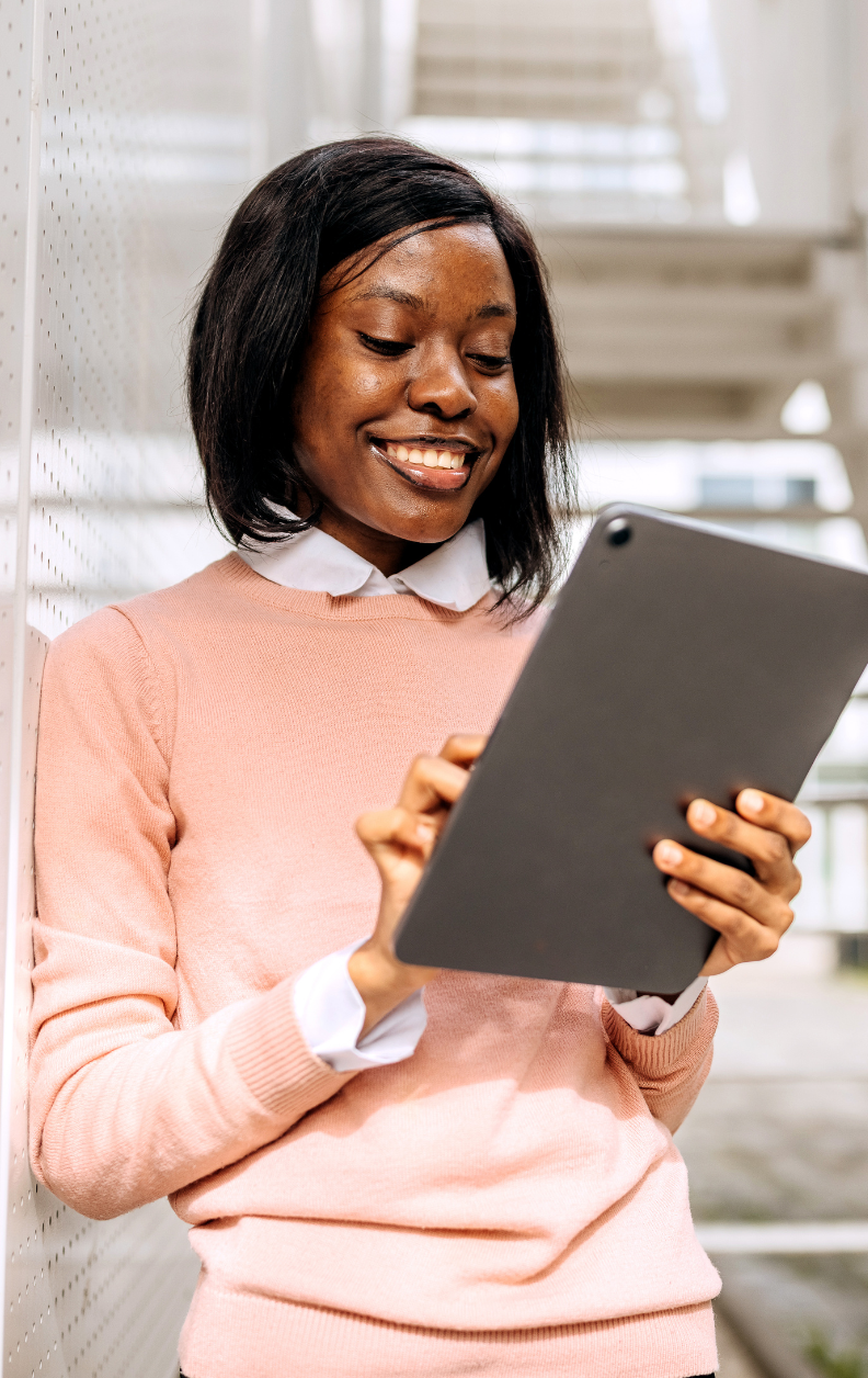 Student holding ipad