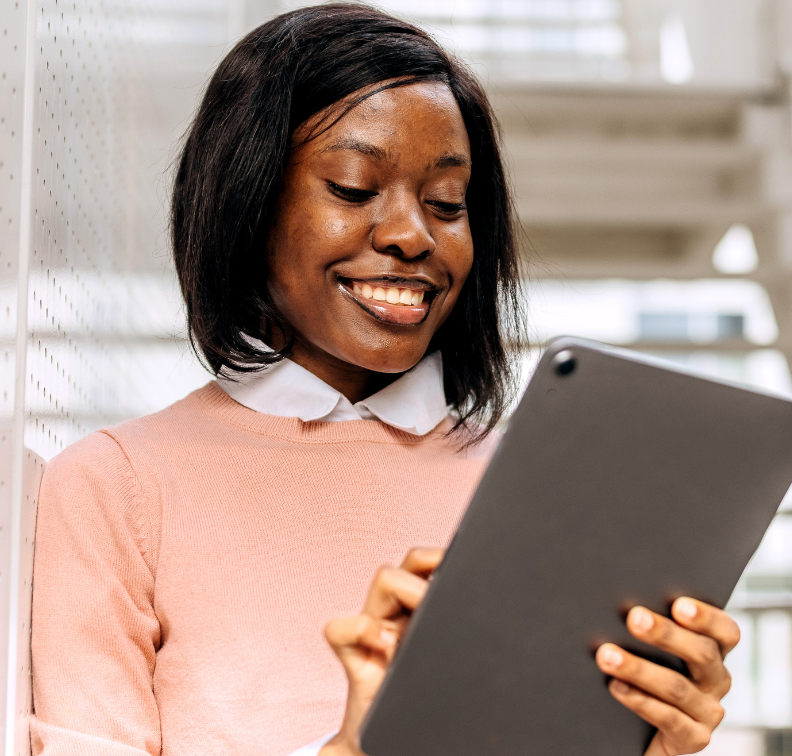 Student holding ipad