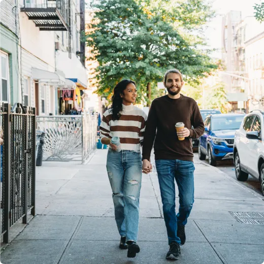 Two people walking down the streets of Annapolis